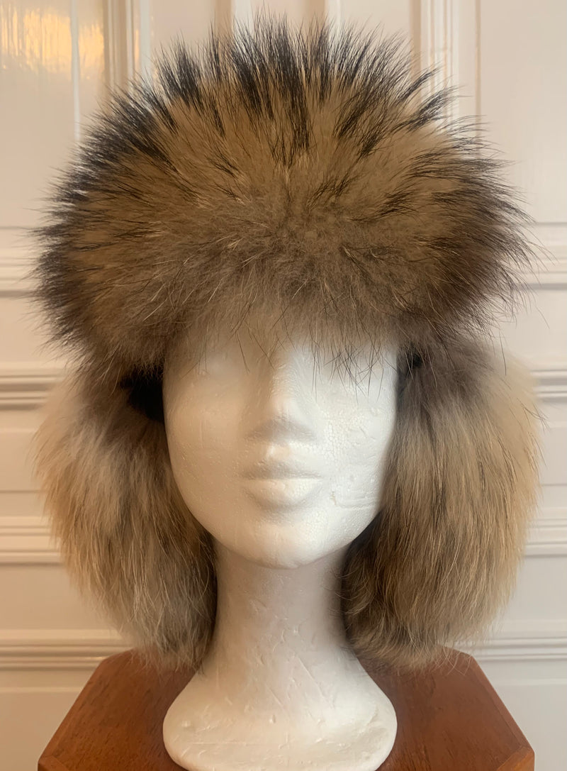 Ear flap hat in sheepskin and fur brim